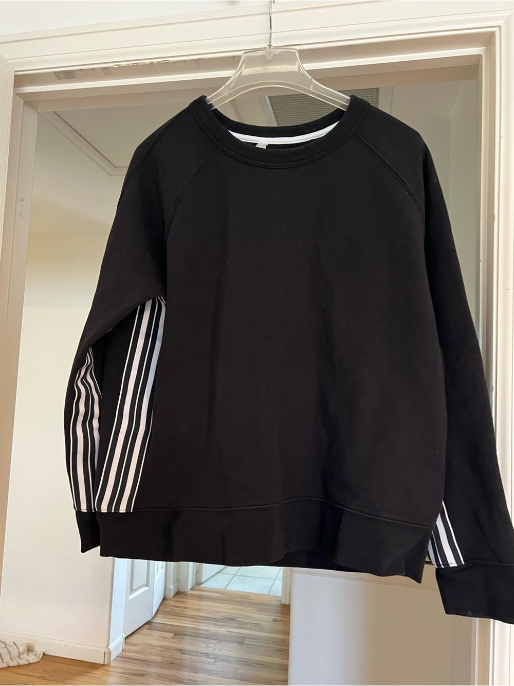 Athleta Black Sweatshirt with Black and White Striped Insets